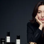 Song Hye-kyo, a global icon, posing elegantly for a luxury brand, highlighting her influence.